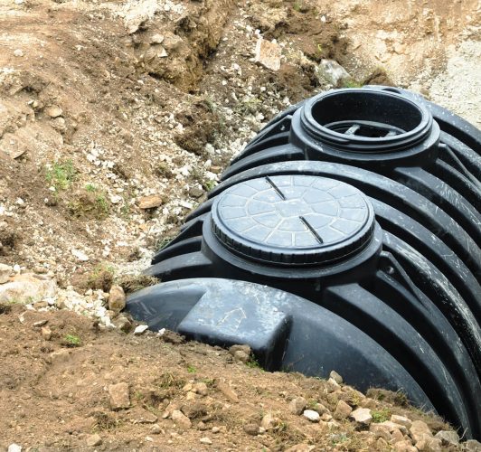 Septic tank partially buried