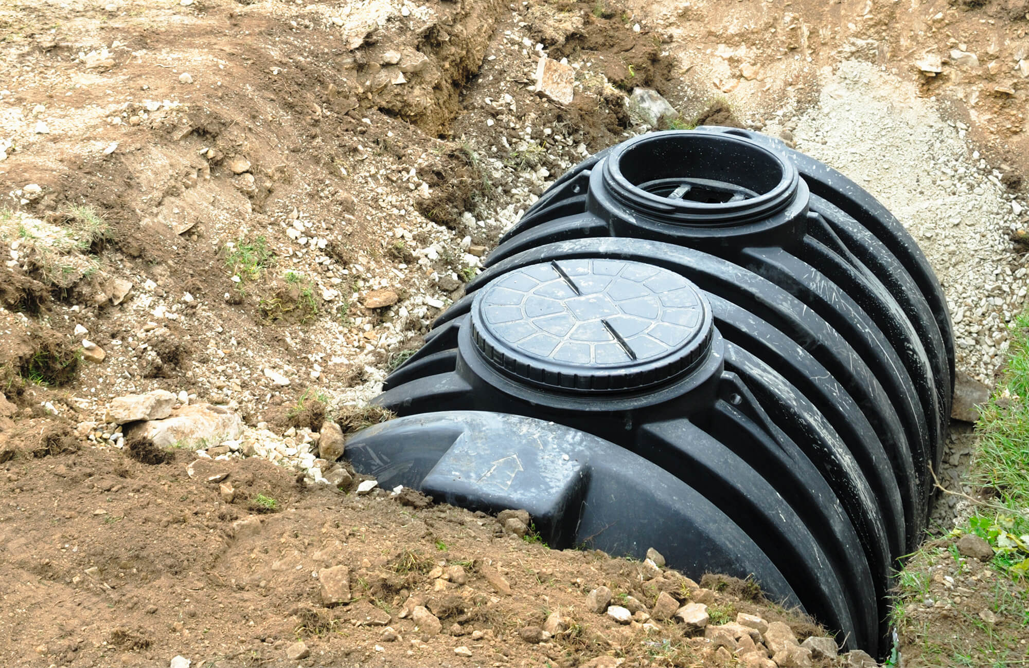 Septic tank partially buried